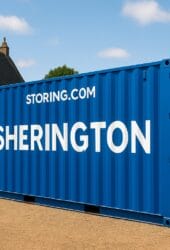 Storing.com self storage container with "Sherington" text in a rural Bedfordshire setting